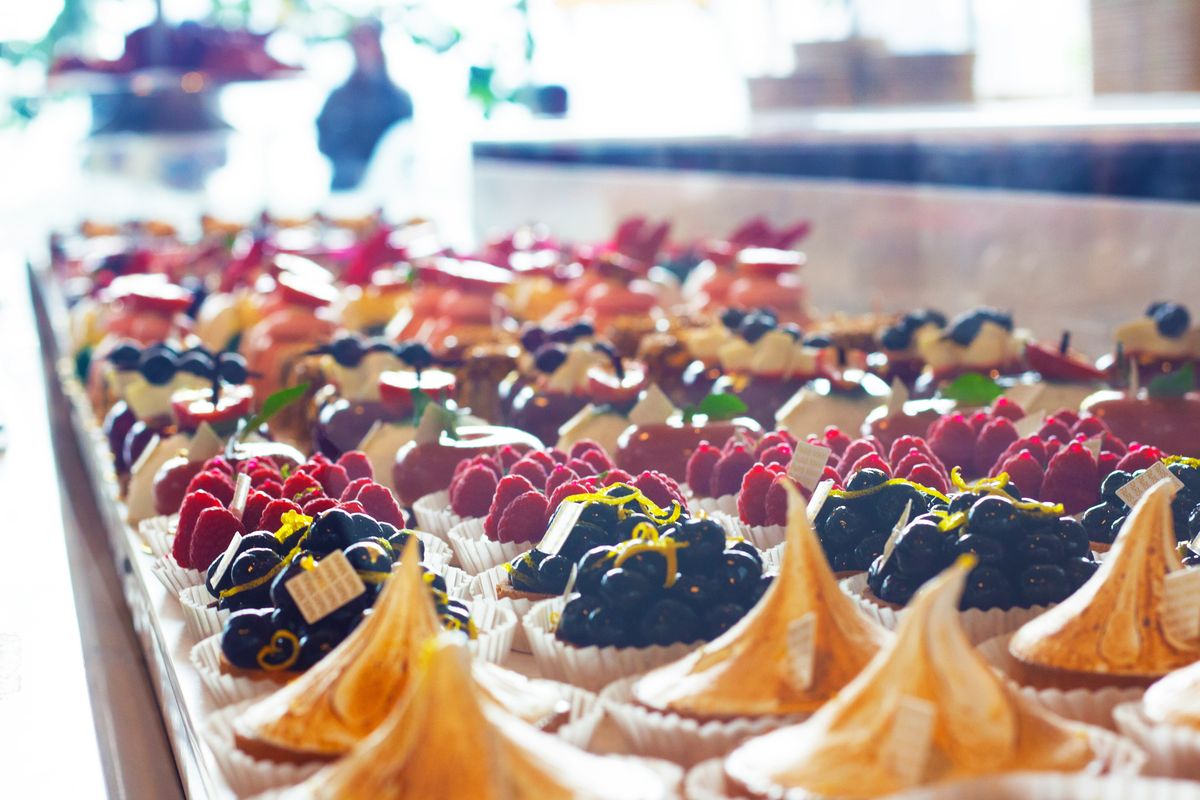 Colourful fruit tarts and patisserie on display