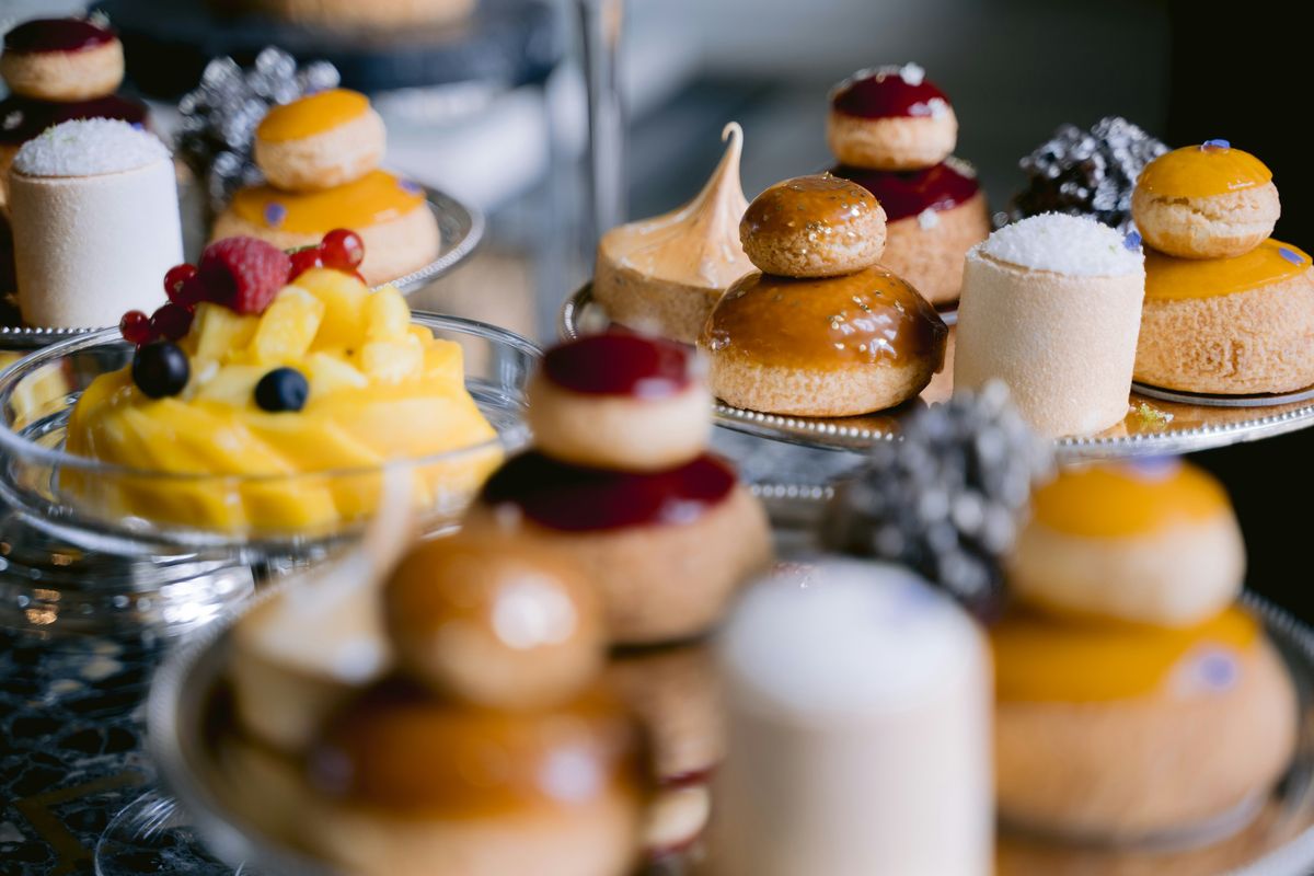 Premium choux pastries and desserts on a display stand